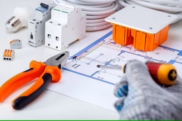 electrician-working-with-electrical-scheme_106035-337